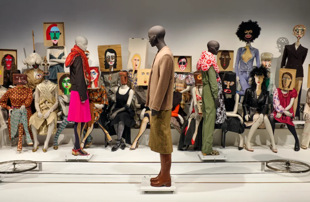 A selection of clothing displayed as part of the Antwerp Six exhibition at Antwerp's Momu museum.